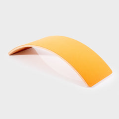 Yellow curved object on a white background