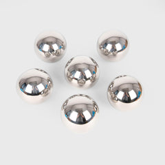 Set of silver metallic balls on a white background