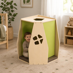 Secret Den with boy sat inside