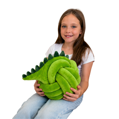 girl holding crocodile cuddle ball