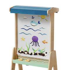 Children's wooden easel with ocean-themed magnetic board and accessories on a white background