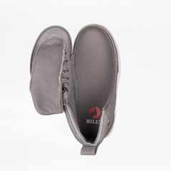 Gray slip-on shoe with a visible brand logo on a white background