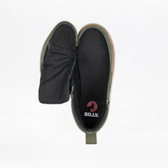 Black slip-on shoe with green interior and 'BILLY' logo on a white background