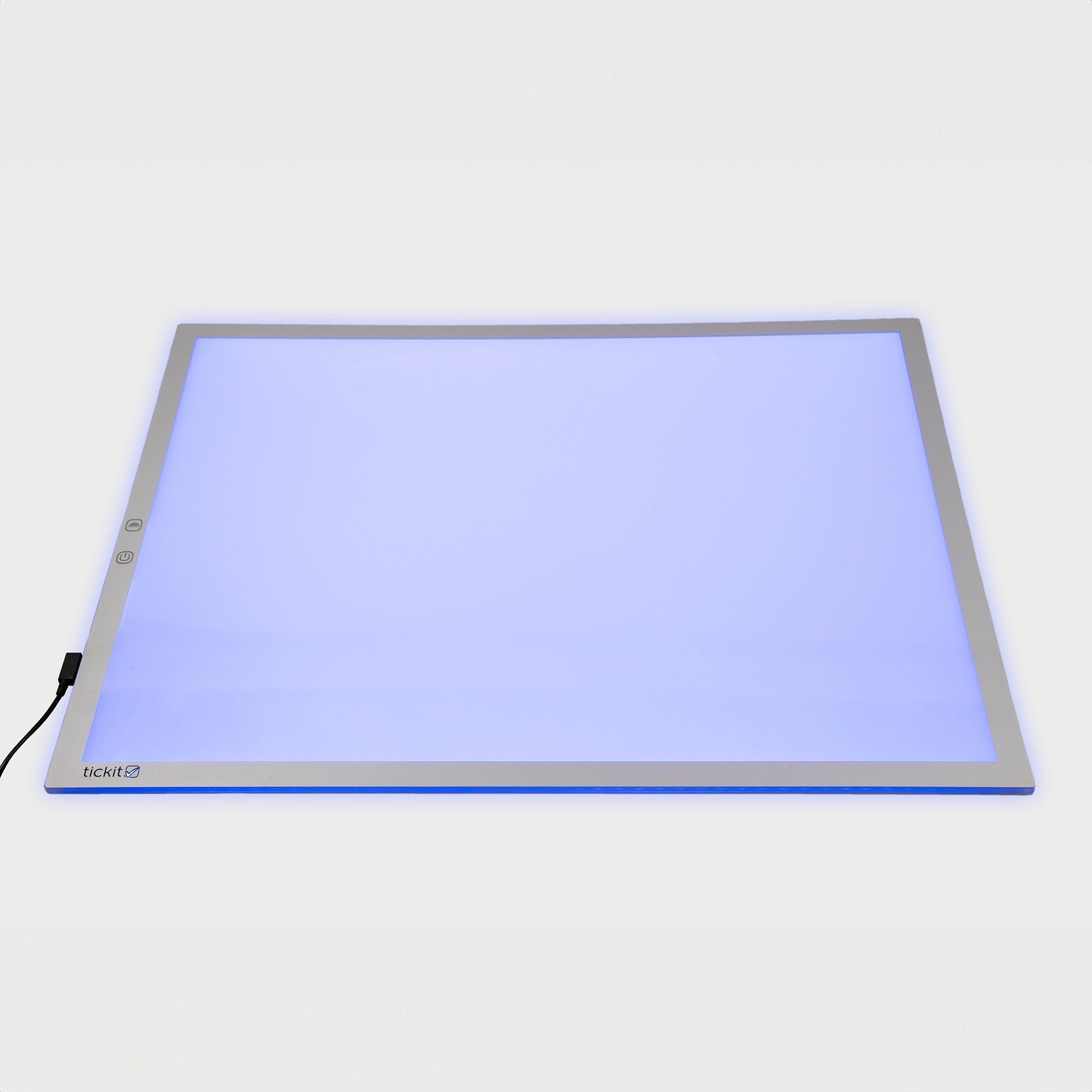 Light pad with blue light on a white background