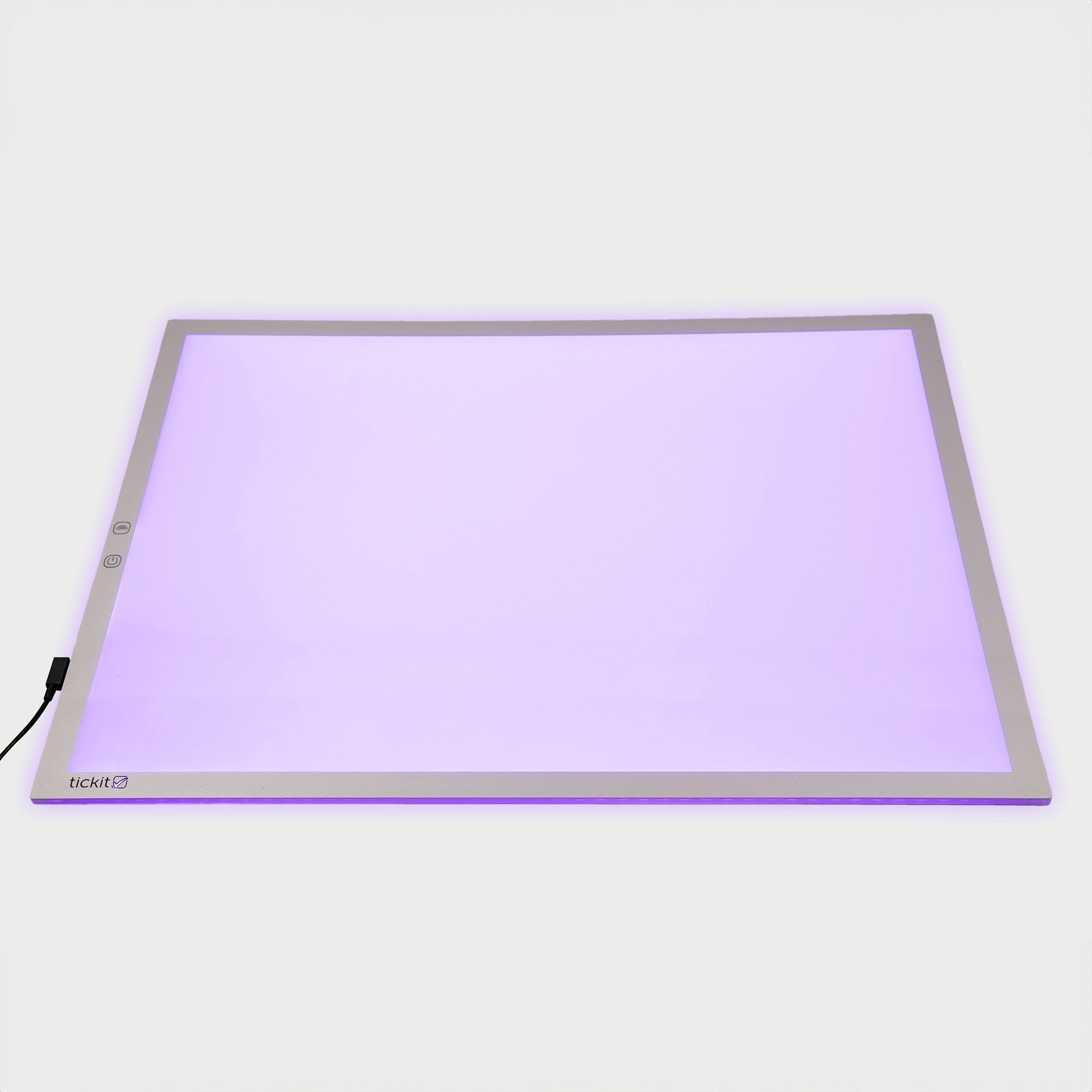Light pad with purple glow on a white background