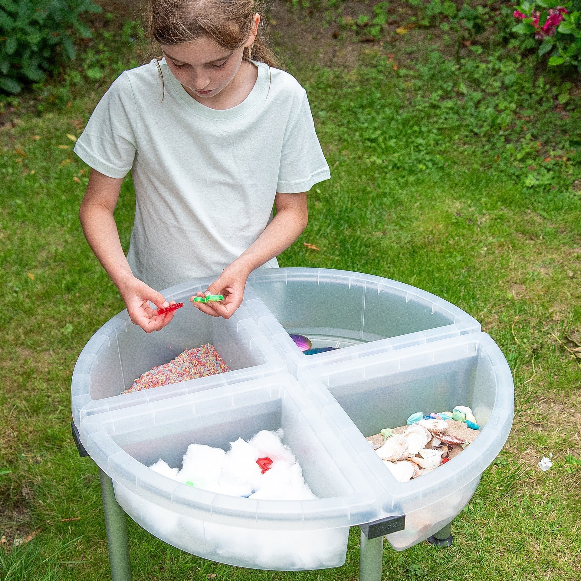 child playng in tickit® Discovery Quadrant Trays & Stand – Clear