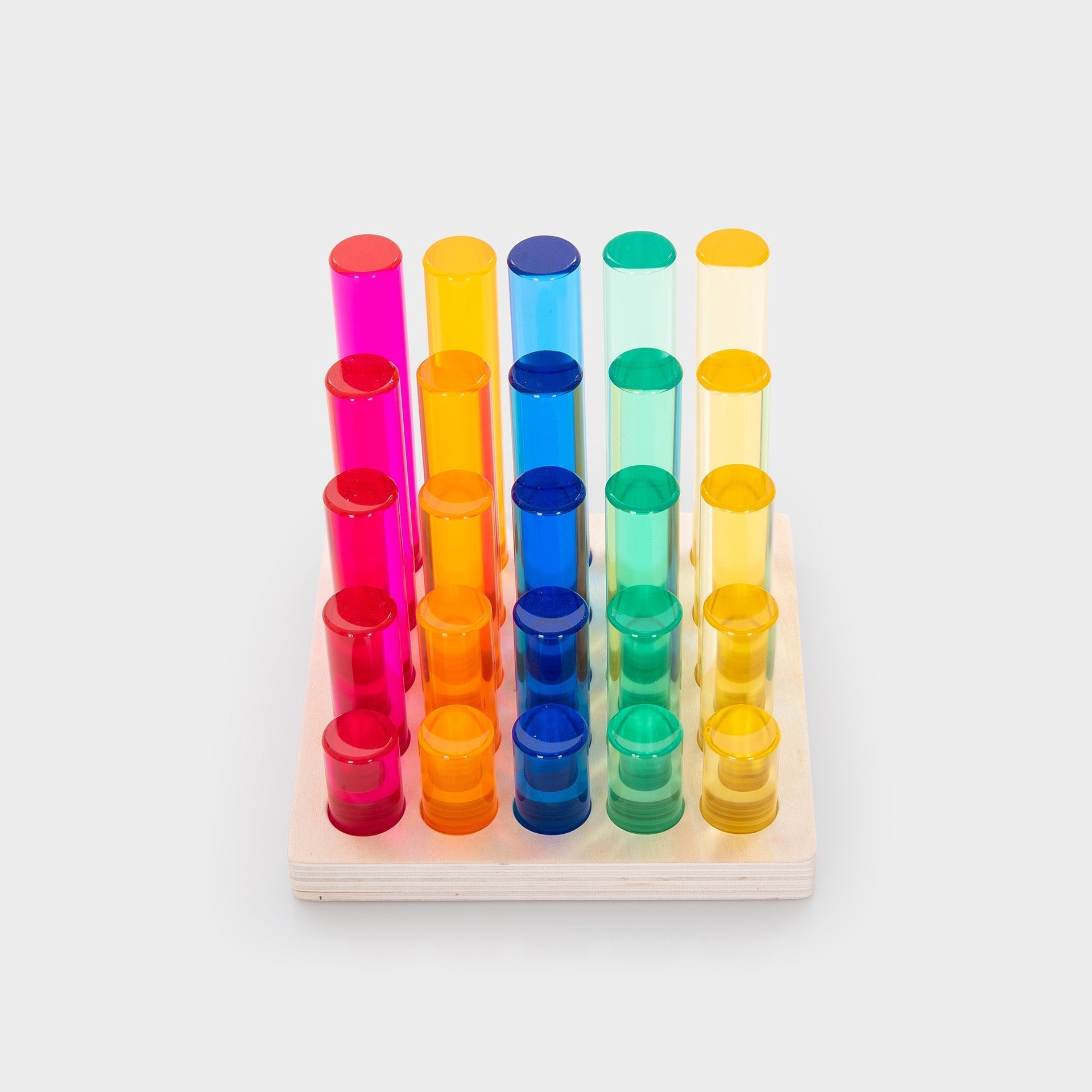 Colorful cylindrical wooden toys on a white background