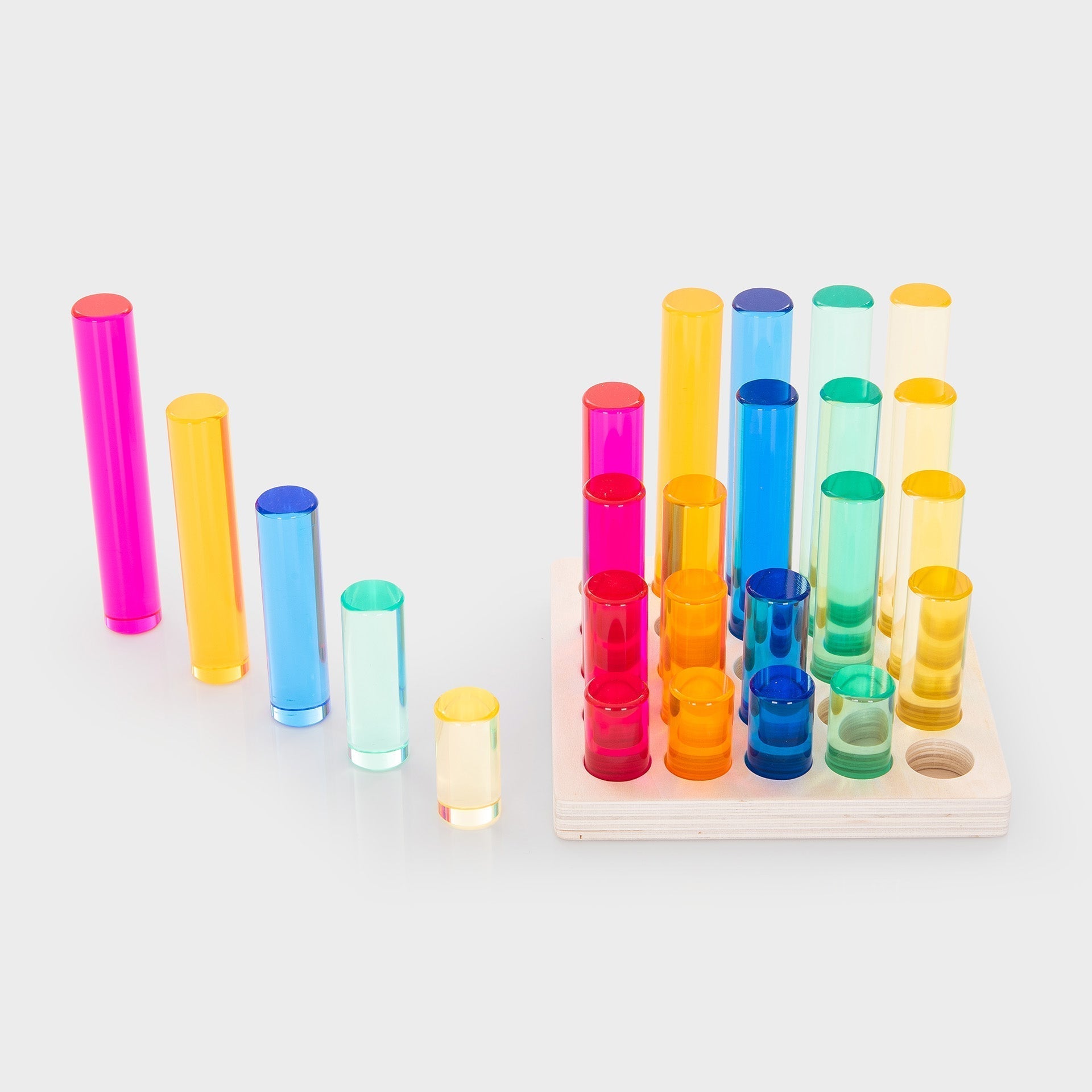 Colorful plastic tubes on a white background