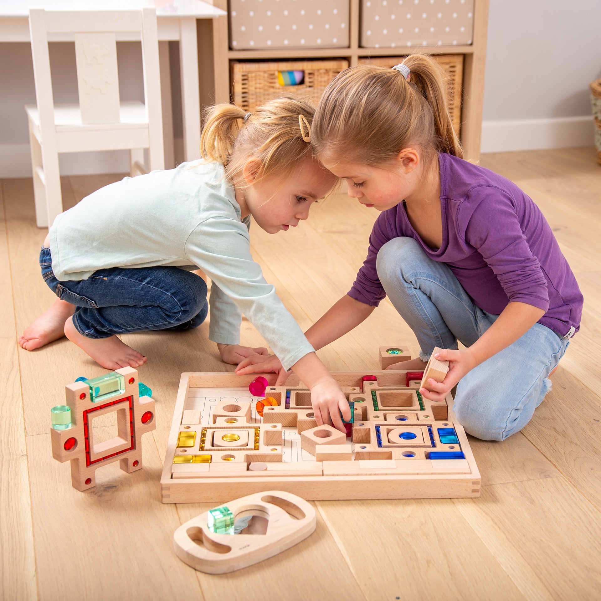 children playing with set of tickit gem puzzle blocks