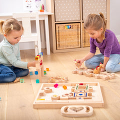 children playing with set of tickit gem puzzle blocks