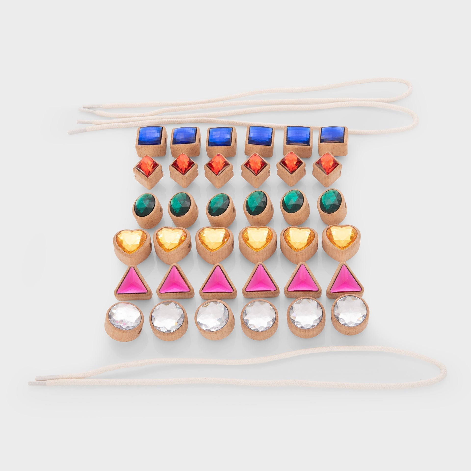 Set of colorful geometric earrings on a white background