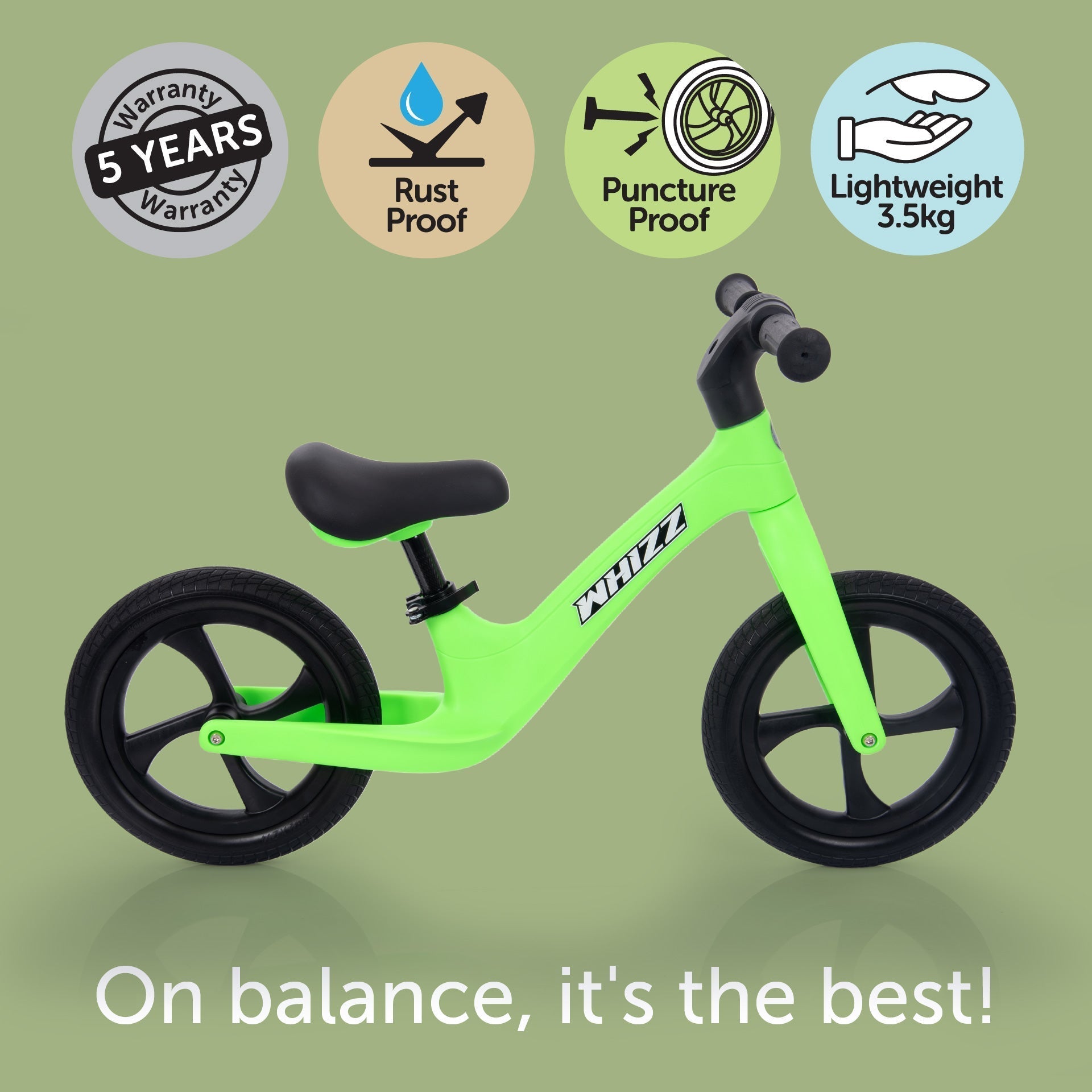 Green balance bike with features on a green background