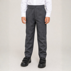 Person wearing gray dress pants with a white shirt on a plain background