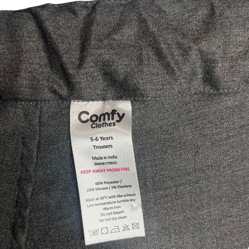 Label on a pair of gray trousers with 'Comfy Clothes' branding.