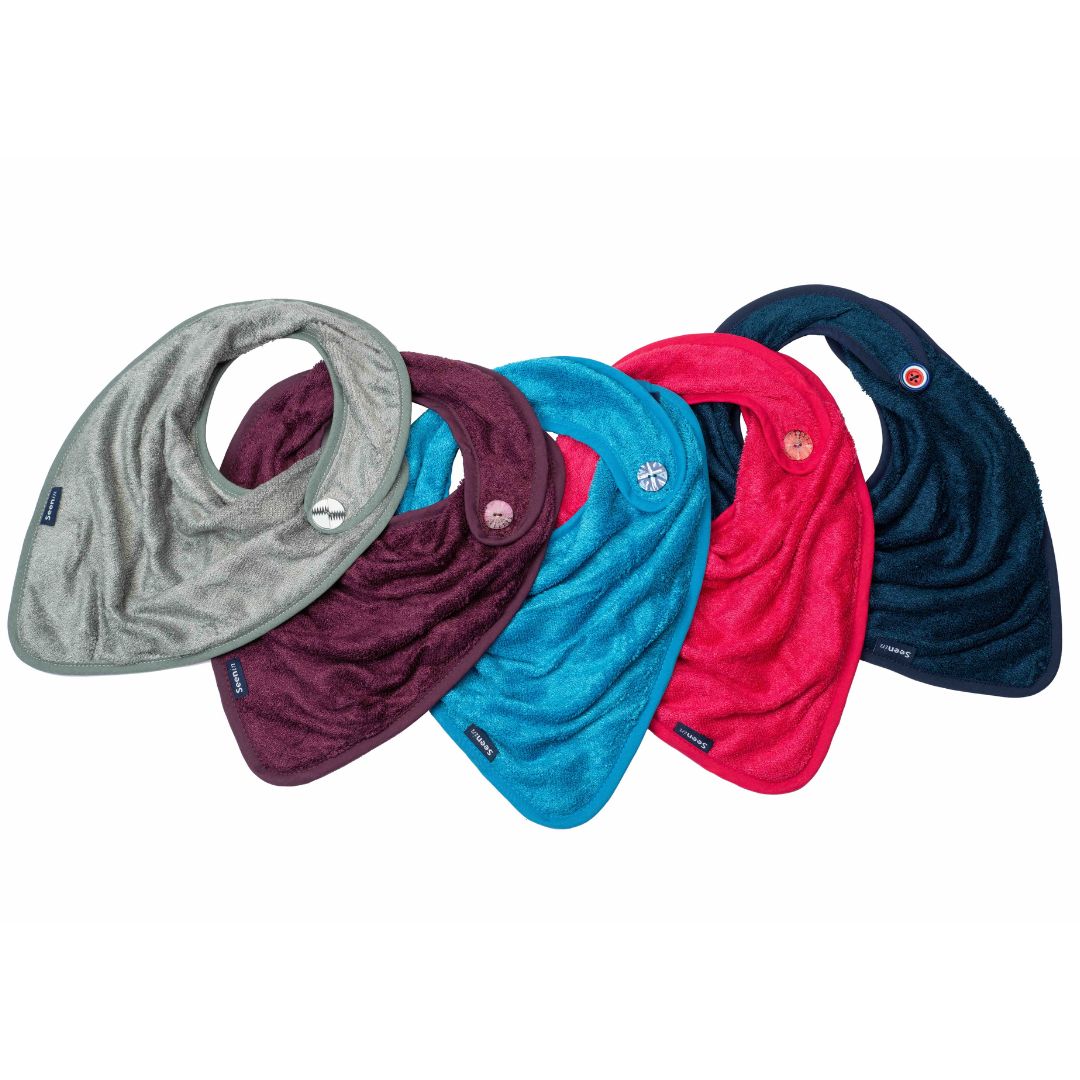 5 bamboo bibs in different colors (gray, burgundy, teal, berry and navy) arranged in a fan shape on a plain white background.