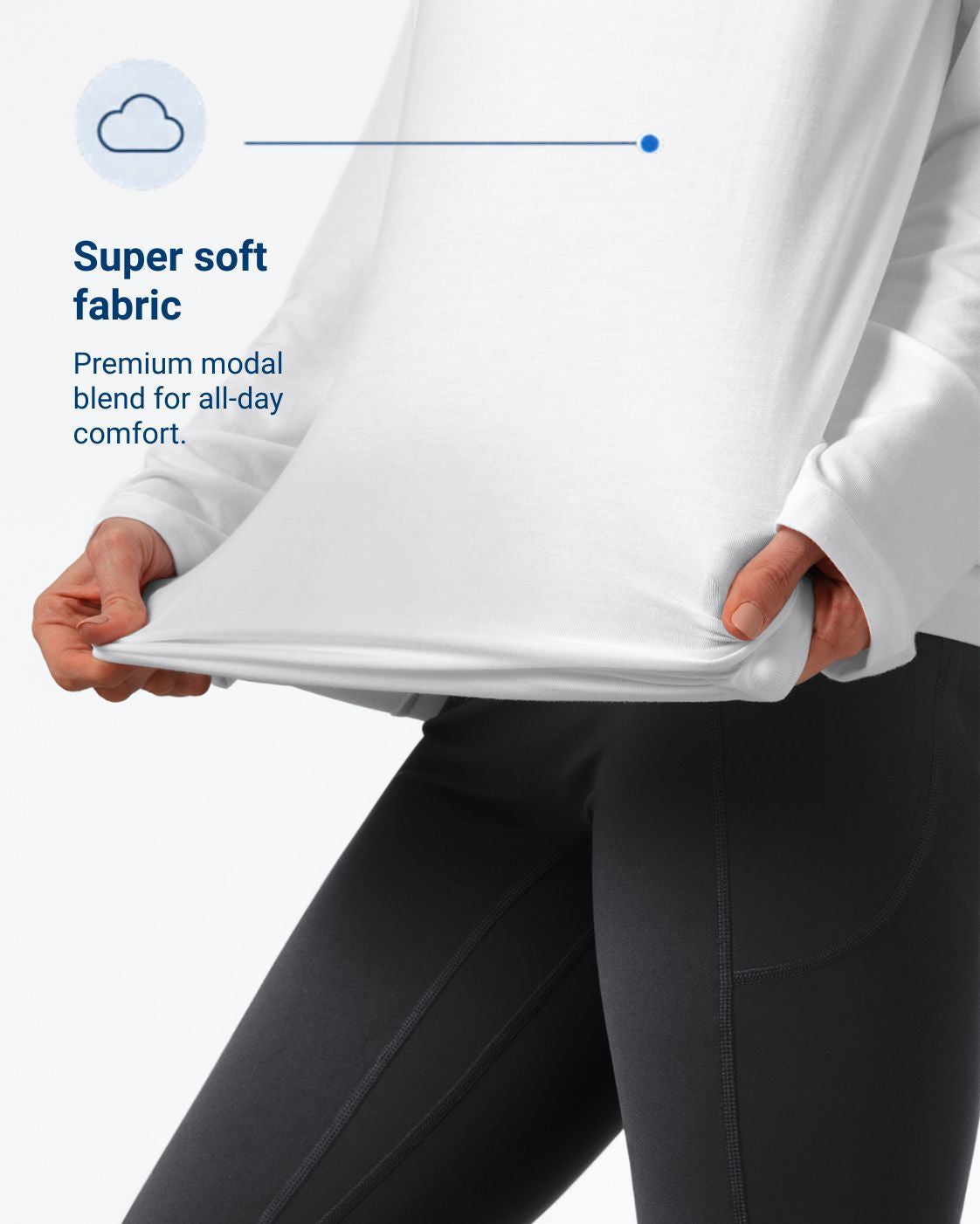 Person holding a folded white shirt with text about super soft fabric and premium modal blend.