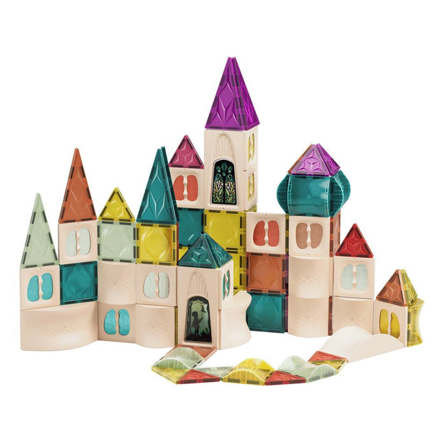 Colorful toy castle made of interlocking blocks on a white background