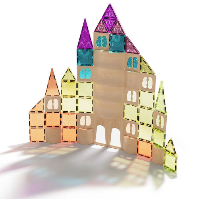 Colorful magnetic building block castle on a white background