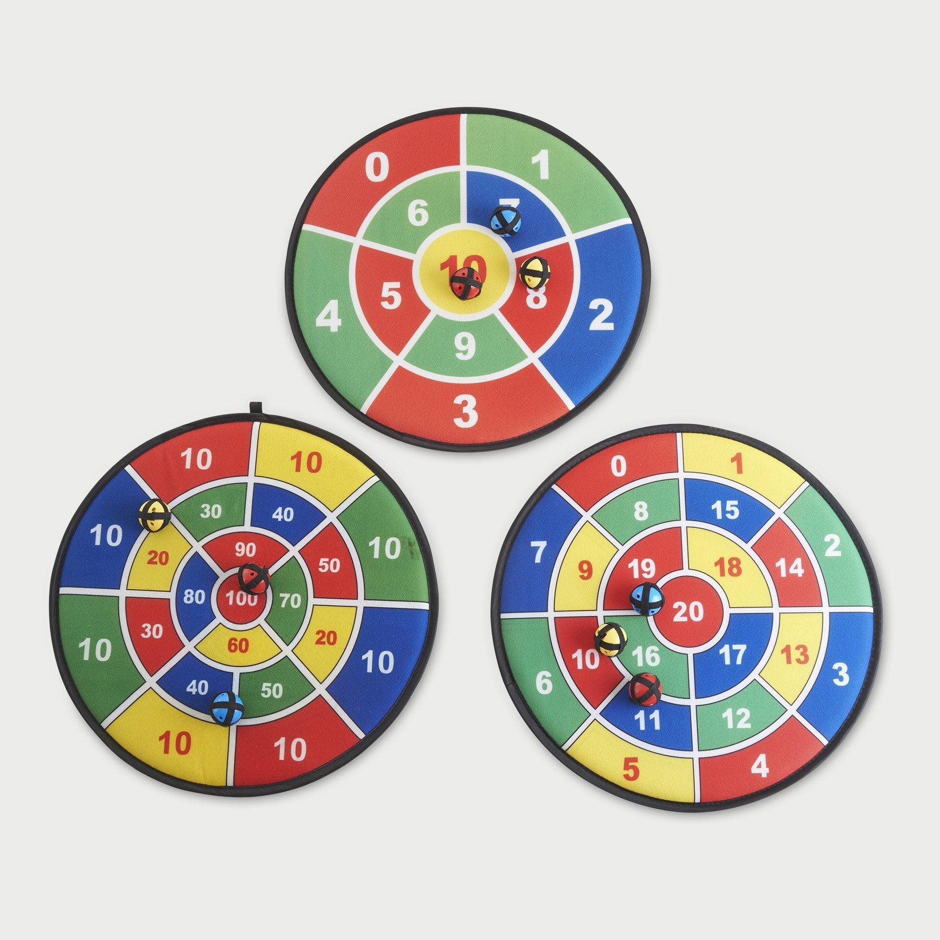 Three colorful dartboards with different scoring zones on a white background