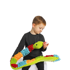 boy with giant tactile fidget snake