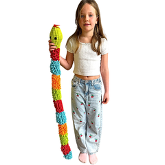 girl with giant tactile fidget snake