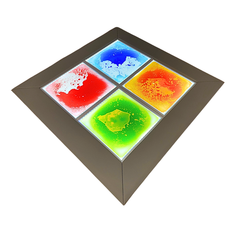 A square decorative tray or plate with a dark brown frame and four brightly lit, colorful inset panels showing abstract splashes of blue, red, orange, and green on a white background.
