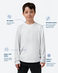 Child wearing a white long-sleeve shirt with text highlighting features on a white background