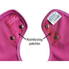 Close-up of pink care product with reinforcing patches labeled on a white background