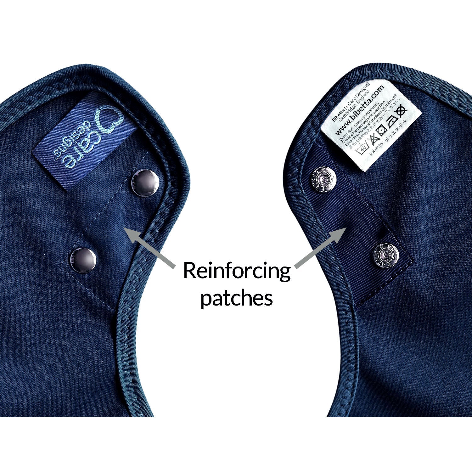 Navy blue fabric with reinforcing patches and Care label on a white background