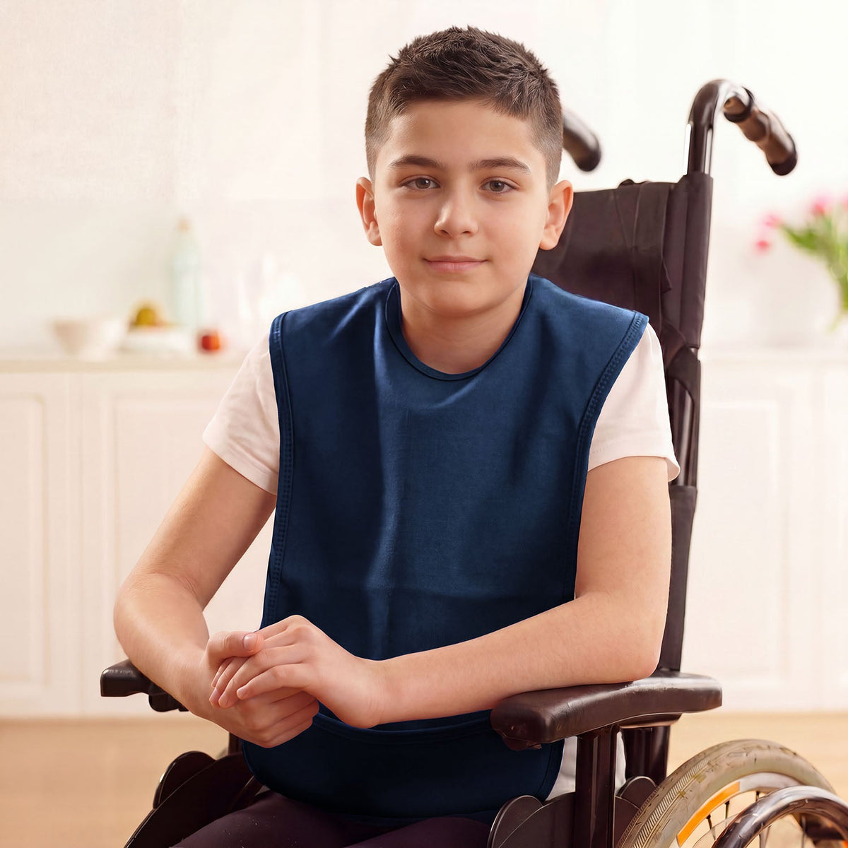boy in junior navy bib