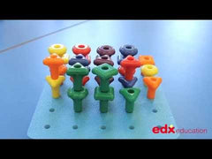 Video showing a Geo Pegs and Peg Board set in use. The set includes a 21cm square foam baseboard, 36 large colourful pegs in six colours and three shapes, and three laces. Demonstrates how children can count, sort, stack, thread, and create patterns using the pegs. The set is designed to support early maths skills and fine motor development in young children.